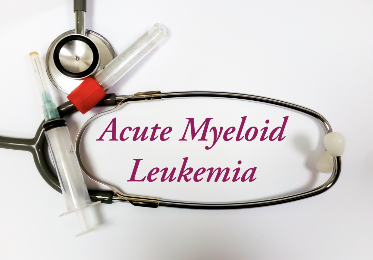 Stethoscope and vials on white background with text reading Acute Myeloid Leukemia
